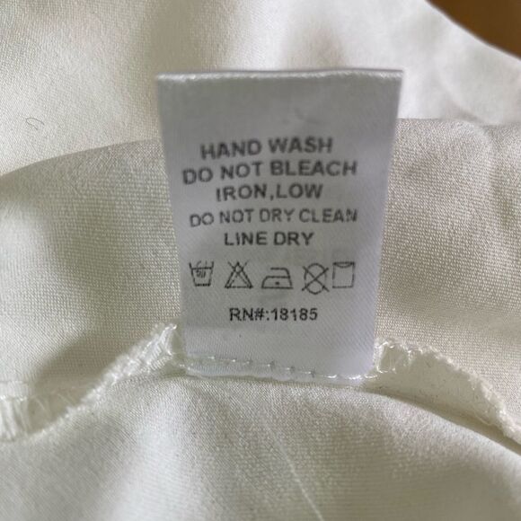 White silk/poly spaghetti strap Cami w/ feathers. V front & back size small - Picture 11 of 12